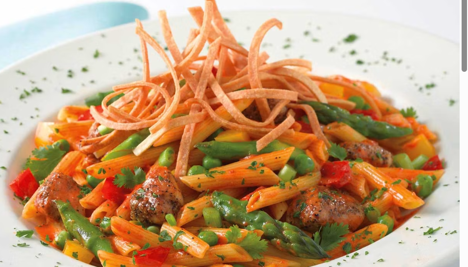 <p>Penne Pasta, Honey Glazed Chicken, Asparagus, Red and Yellow Peppers, Peas, Garlic and Onion in a Spicy Chipotle Parmesan Cream Sauce</p>