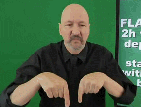 <p>Two fingers pointing down, pull one up like a flamingo is standing on one leg</p>