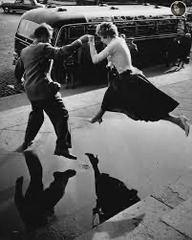 <p>A student analyzing the work of Henri Cartier-Bresson would MOST likely focus on:</p>