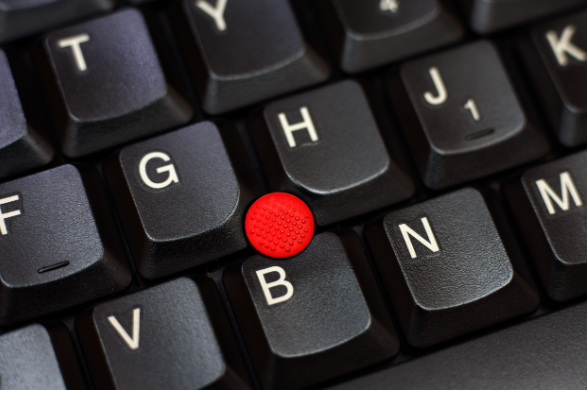 <p>A small, red, joystick-like pointing device embedded in the center of a laptop keyboard (most famously on Lenovo ThinkPads) used to control the cursor without lifting hands from the keyboard. </p>