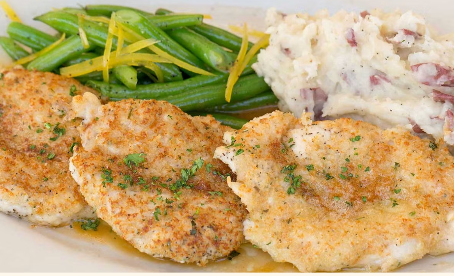 <p>Sauteed Chicken Breasts Coated with Parmesan-Garlic Breadcrumbs and Herbs. Served with Mashed Potatoes and Green Beans</p>