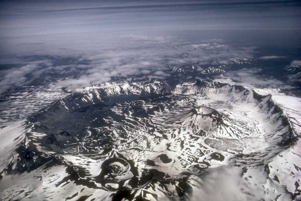 <p>a summit depression typically greater than 1 kiometer in a diameter, sometimes produced by collapse following a massive eruption </p>