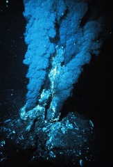 <p>A hydrothermal vent on the ocean floor that emits a black cloud of hot water filled with dissolved metal particles.</p>