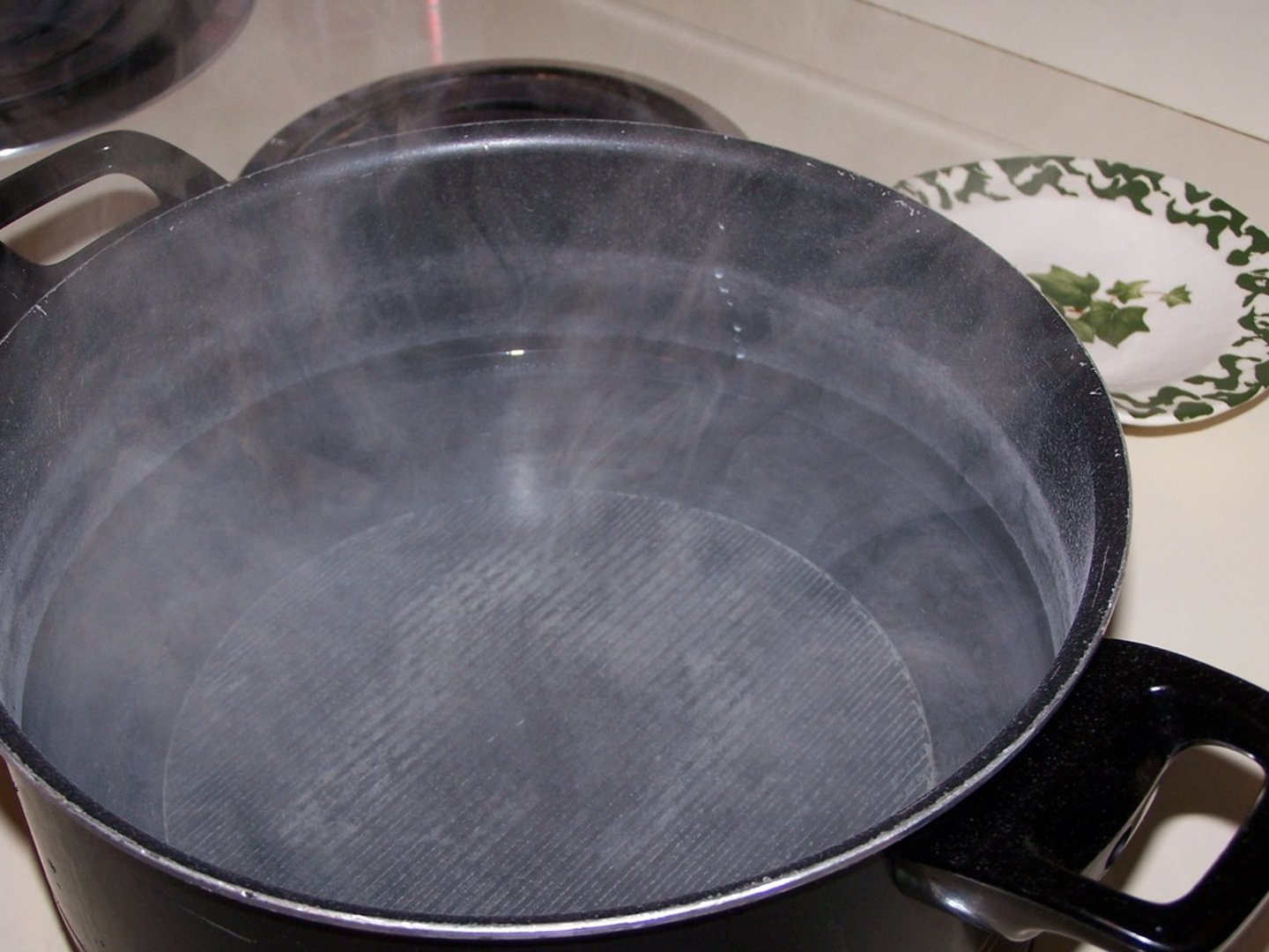 <p>to cook liquids down so that some of the water evaporates</p>
