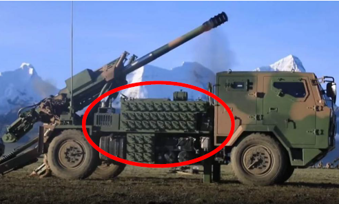 <p>A wheeled 122mm self-propelled howitzer built on a Shaanxi 6x6 truck chassis with a 4-door cab and a distinctive perforated gun shield.</p>
