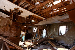<p>in separate parts; apart from each other in position</p><p>When the earthquake stopped, and we came up from our shelter, we found the city had been torn _______ and not one single building was left standing.</p>