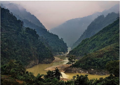 <p>A rejuvenation landform: a new, narrower, deeper valley cut within the original wider valley. The old valley sides form terraces above the new valley.</p>