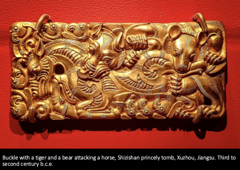 <p><span>Buckle with a tiger and a bear attacking a horse</span></p>