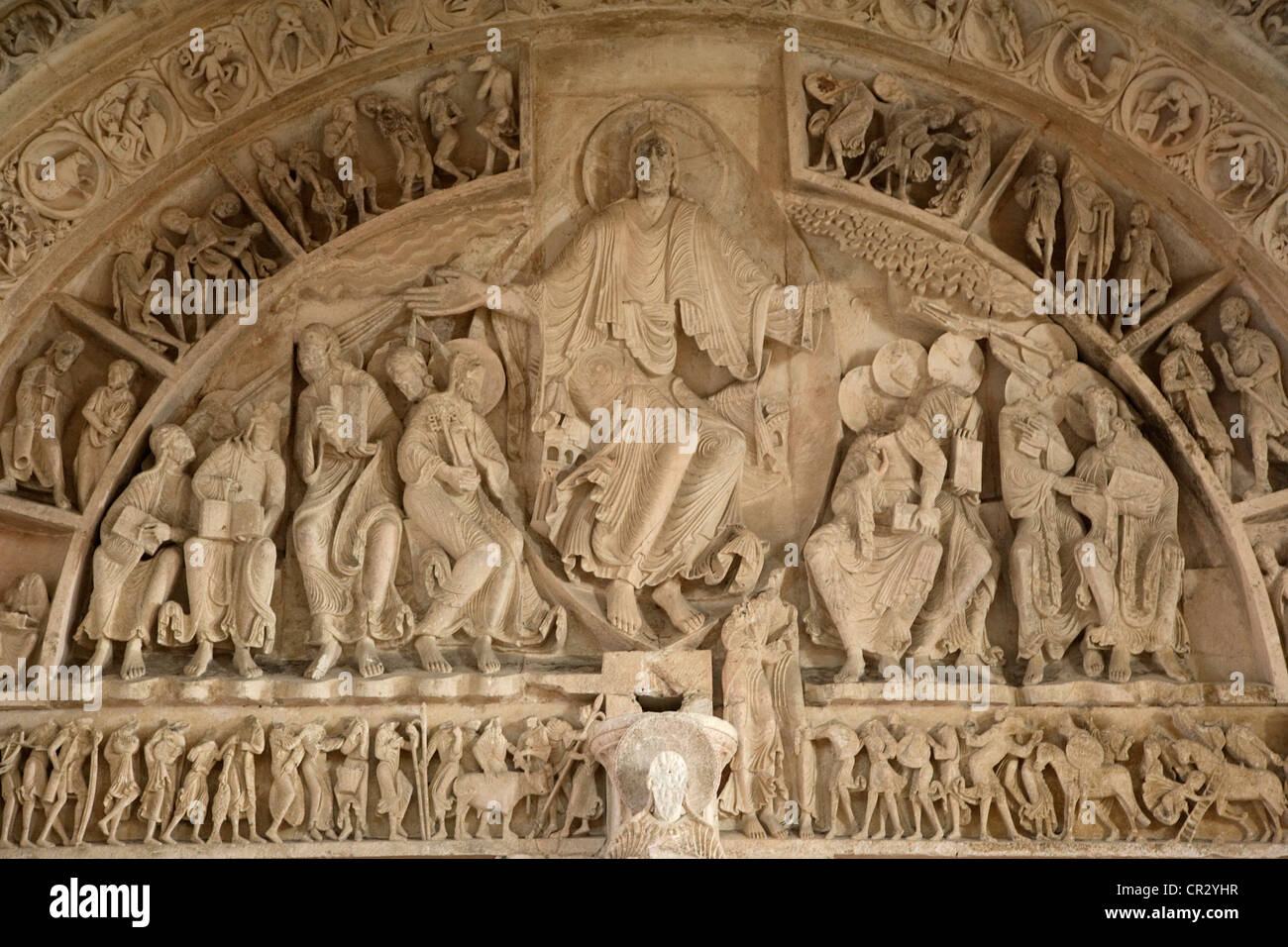 <p>A Romanesque relief sculpture depicting the descent of the Holy Spirit upon the Apostles, symbolizing the birth of the Church, located above the main entrance of the Sainte Madeleine in Vézelay, France. </p>