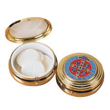 <p>metal case in which the lunette is kept in the tabernacle, a smaller version shaped like a pocket-watched is used to bring Holy Communion to the sick and homebound</p>