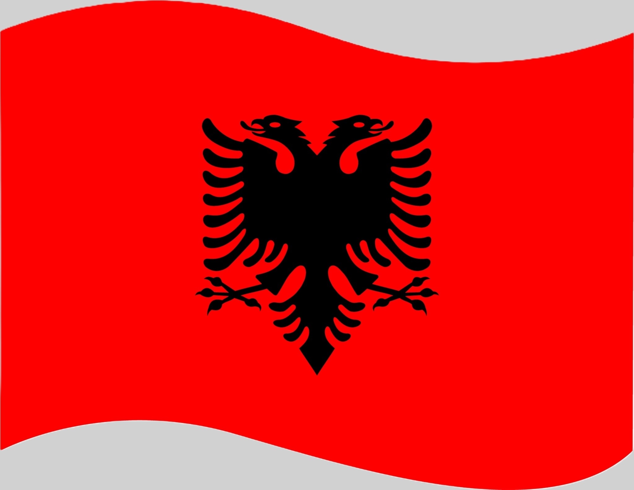 <p>The flag of Albania is red with a black double-headed eagle in the center. The red color represents bravery, strength, and the sacrifices made for freedom. The black eagle is a symbol of independence and courage. The flag reflects Albania’s proud history and strong national identity. </p>