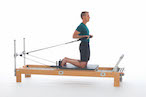 <p><strong>Setup</strong></p><ul><li><p>Start in Circles Up position (Page 75 MAWB)</p></li><li><p>Arms straight and back of trunk, parallel to each other (as closes as possible)</p></li><li><p>Hands holding straps</p></li><li><p>Resistance: medium | <strong>Springs: 1B or 1R</strong></p></li></ul><p><strong>Movement</strong></p><ul><li><p>Exhale: Bend arms</p></li><li><p>Inhale: Straighten arms, return to start position</p></li></ul><p><strong>Muscle Focus</strong></p><ul><li><p>Biceps</p></li><li><p>Abdominals</p></li><li><p>Back extensors</p></li></ul><p><strong>Objectives</strong></p><ul><li><p>Elbow flexor strength</p></li><li><p>Shoulder flexor stretch</p></li><li><p>Trunk stabilization</p></li></ul><p><strong>Cues</strong></p><ul><li><p>Maintain trunk stabilization, avoiding ribs flaring</p></li><li><p>Keep upper arms and elbows stable</p></li><li><p>Maintain neutral position of scapulae (as close as possible)</p></li><li><p>Maintain neutral position of wrists</p></li></ul><p></p>