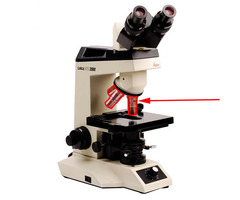 <p>Adjustable lens system that permits the use of a low power lens, a medium lens, or a high power lens</p>