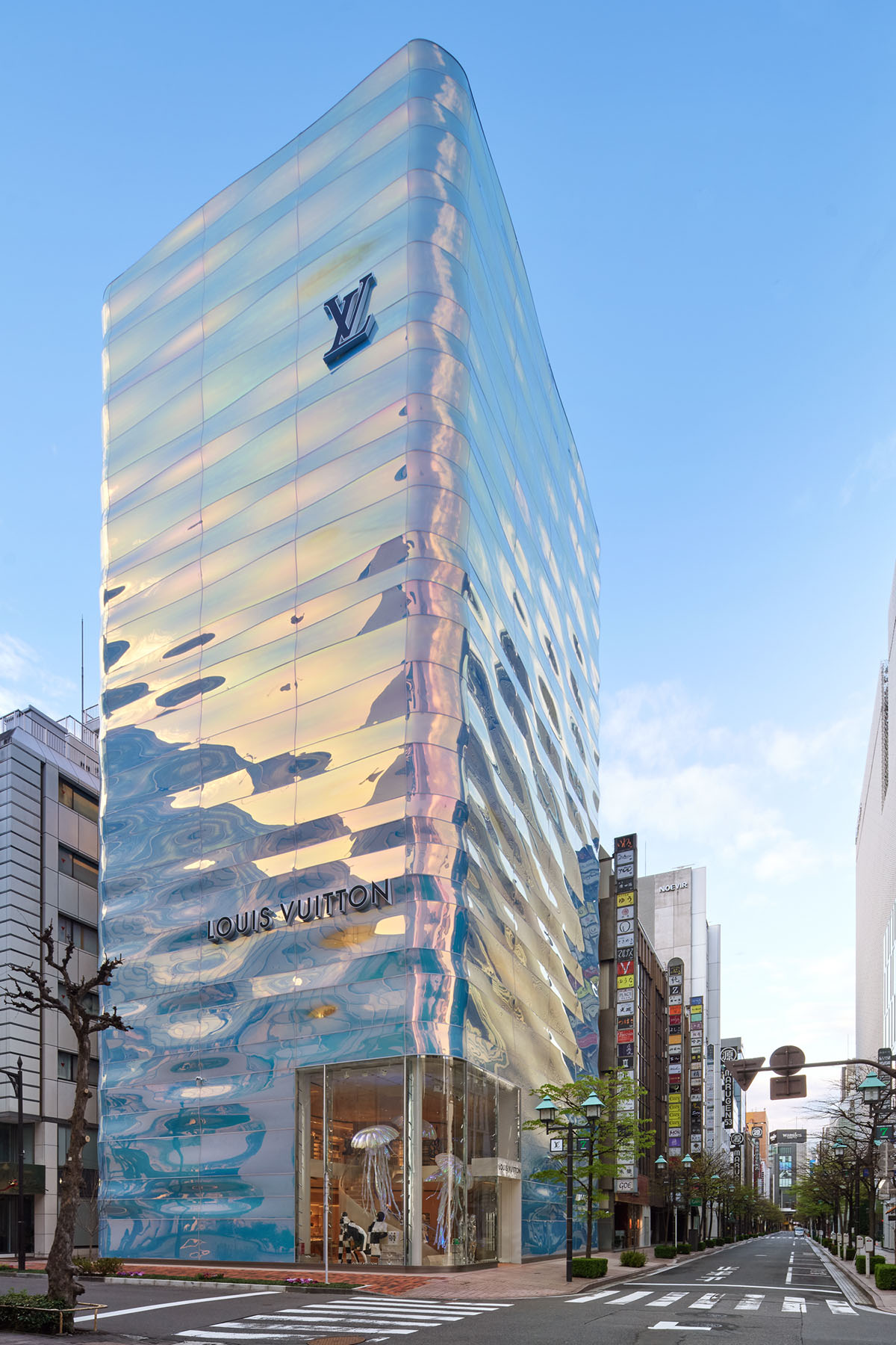 <p>Undulating, pearlescent, facade.</p>