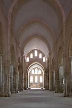<p>The Abbey Church of Fontenay, a prime example of Romanesque architecture, showcases the Cistercian principles of simplicity and harmony with nature. Its design features a longitudinal layout, minimal decoration, and a focus on light, embodying the monastic ideals of contemplation and spirituality. Constructed in the 12th century, it is notable for its use of stone vaults and open spaces that enhance the spiritual atmosphere, reflecting the Cistercian commitment to a plain yet profound ecclesiastical setting. </p>