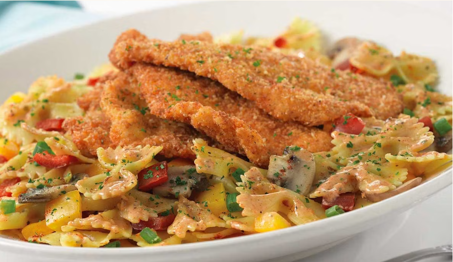 <p>Parmesan Crusted Chicken Served Over Pasta with Mushrooms, Peppers and Onions in a Spicy New Orleans Sauce</p>