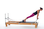 <p><strong>Setup</strong></p><ul><li><p>Starting in Front Support (Mat page 38) position, heels against shoulder rests</p></li><li><p>Resistance: light | <strong>Springs: 1R or 1R+1Y</strong></p></li></ul><p><strong>Movement</strong></p><ul><li><p>Inhale: Move body forward</p></li><li><p>Exhale: Move body back, return to start position</p></li></ul><p><strong>Muscle Focus</strong></p><ul><li><p>Spinal flexors</p></li><li><p>Spinal extensors</p></li><li><p>Shoulder flexors</p></li><li><p>Scapular stabilizers</p></li></ul><p><strong>Objectives</strong></p><ul><li><p>Trunk stabilization</p></li><li><p>Shoulder flexor strength</p></li><li><p>Scapular stabilization</p></li></ul><p><strong>Cues</strong></p><ul><li><p>Maintain trunk stabilization</p></li><li><p>Maintain scapular stabilization</p></li><li><p>Keep head aligned with spine</p></li><li><p>Bias toward slight posterior tilt of pelvis</p></li><li><p>Move carriage forward until shoulders are over footbar</p></li></ul><p></p>