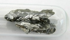 <p>an element that has some of the characteristics of metals and some characteristics of nonmetals, and are semiconductors, located in between the groups of metals and non-metals on the periodic table.</p><p>ex. arsenic</p>