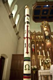 <p>Large, decorated candle blessed at Easter, symbolizing the Risen Jesus, used during Easter season and for baptisms and funerals</p>