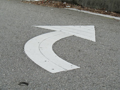 <p>What is the purpose of pavement markings on roadways?</p>
