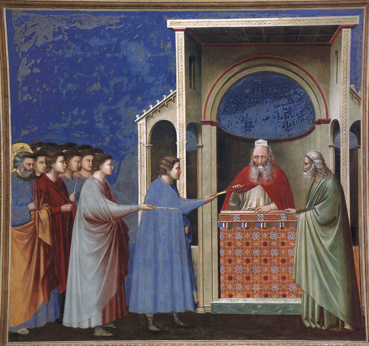 <ul><li><p>Depicts the men descended from the Tribe of David of marriageable age, excited to potentially be the husband of the Virgin Mary, bringing forth their rods as commanded by the High Priest according to the story that one of their rods will bloom with doves when presented to Mary, and the owner of that rod will be the wife of Mary</p></li><li><p>Depicts St. Joseph (on the far left) as hesitant to marry her as he is aware he is too old for her</p></li></ul><p></p>