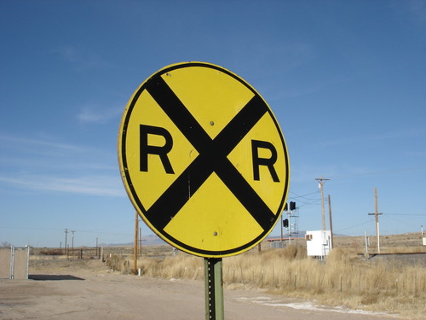 <p>33. This sign is a warning that you are approaching</p><p>A. A railroad crossing.</p><p>B. An intersection.</p><p>C. A blasting zone.</p><p>D. A crosswalk.</p>