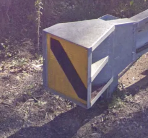 <p>Yellow guardrail end</p>