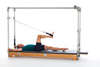 <p><strong>Setup</strong></p><ul><li><p>Lying supine in neutral spine position, legs parallel, one foot in strap, dorsiflexed, hip and knee at 90 degrees, other leg placed on mat, leg straight, foot plantarflexed, hands holding F2 handles arms bent at 90 degrees in elbow and shoulder joints or arms, straight overhead, holding poles thumbs wrapped around</p></li><li><p>Socket: F, Lever Orientation: 0, Lever Length: 1, Lever Direction: 2, Connector: N/A, Spring: N/A</p></li><li><p>Resistance: light to medium</p></li></ul><p><strong>Movement</strong></p><ul><li><p>Exhale: Straighten leg</p></li><li><p>Inhale: Bend leg, return to start position</p></li></ul><p><strong>Muscle Focus</strong></p><ul><li><p>Hip extensors</p></li><li><p>Knee extensors</p></li><li><p>Spinal flexors</p></li><li><p>Spinal extensors</p></li></ul><p><strong>Objectives</strong></p><ul><li><p>Hip extensor control</p></li><li><p>Knee extensor control</p></li><li><p>Pelvic lumbar stabilization</p></li></ul><p><strong>Cues</strong></p><ul><li><p>Initiate movement with hip extensors</p></li><li><p>Keep heel traveling along horizontal line</p></li><li><p>Maintain pelvic lumbar stabilization</p></li><li><p>Keep supporting leg elongated and stable</p></li></ul><p></p>