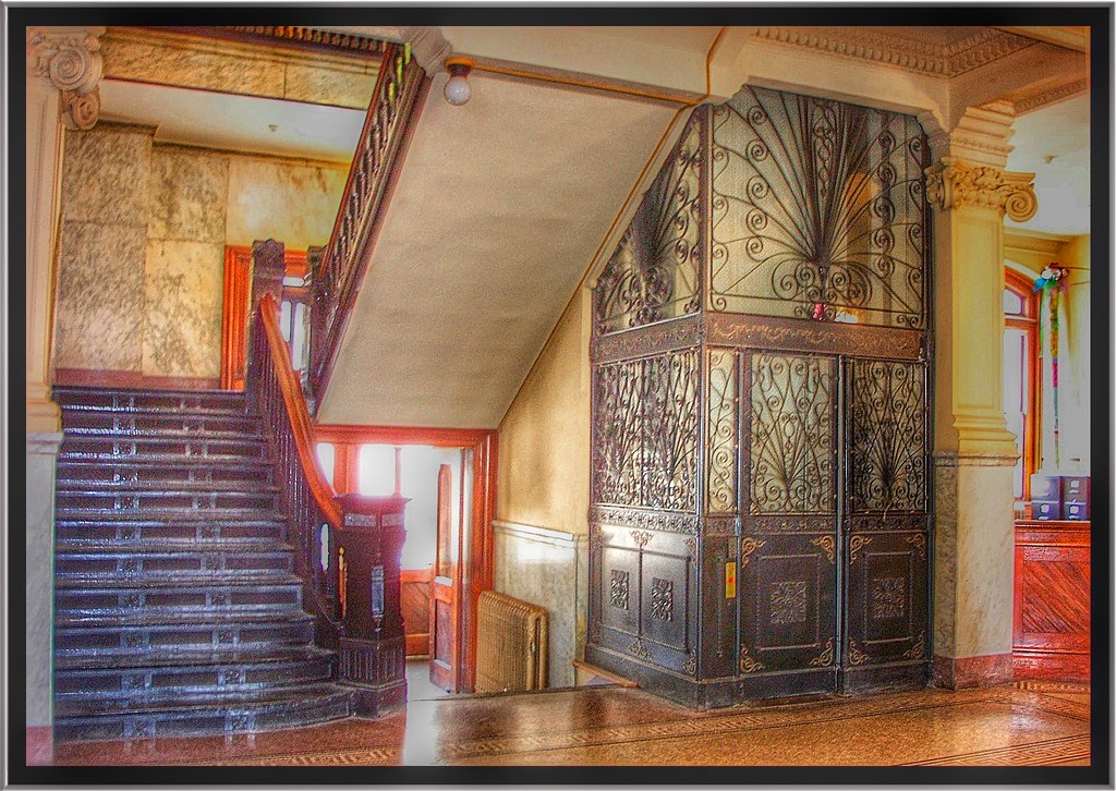 <p>-Metal grillwork elevator</p><p>-2 architects worked on it, each liked a different style so building combines them</p><p>-Main entrance has Terrazo flooring</p><p></p>