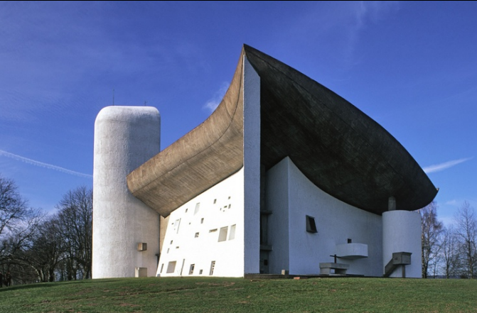 <p>This simple oddly shaped expressionist pilgrim church that has irregular windows and a billowing concrete/steel roof. The odd windows allow for emotional light to spew through the barely roof-touching walls and the windows creating a magnificent light display</p>