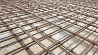<p><span><strong>steel in the </strong></span>form<span><strong> of </strong></span>bars<span><strong> or a mesh (= wires that cross over each other), put inside </strong></span>concrete<span><strong> to make it </strong></span>stronger<span><strong>: </strong></span></p>
