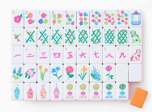 <p>Radiant hues of coral, orange, and neon pink; playful florals.</p>