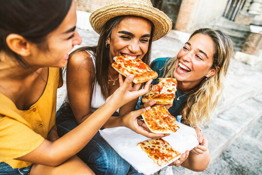 <p>chow down on</p><p>(We can chow down on pizza right after the game.)</p>