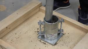 <p>Determines optimum H2O content for compaction treatments. Example: Gravel from a dump truck + roller &amp; vibration for compaction. (Presettlement) You need wet gravel, but not too much, because water reduces friction, but not enough to fill the pore space. Fill the cylinder just barely above the top. The piston is pushed down for a certain distance (# of drops) 5.5 lb hammer (25 drops per se), measure distance, put the sample in oven to determine dry density, you now have volume and mass (D=M*V), re-run trials to provide a compaction curve. The graph plots H2O content against dry density. <strong>GIVES YOU </strong><span style="color: red;"><strong>MAX DRY DENSITY</strong></span> and <span style="color: red;"><strong>OPTIMUM H2O</strong></span> content for compaction treatments. </p>