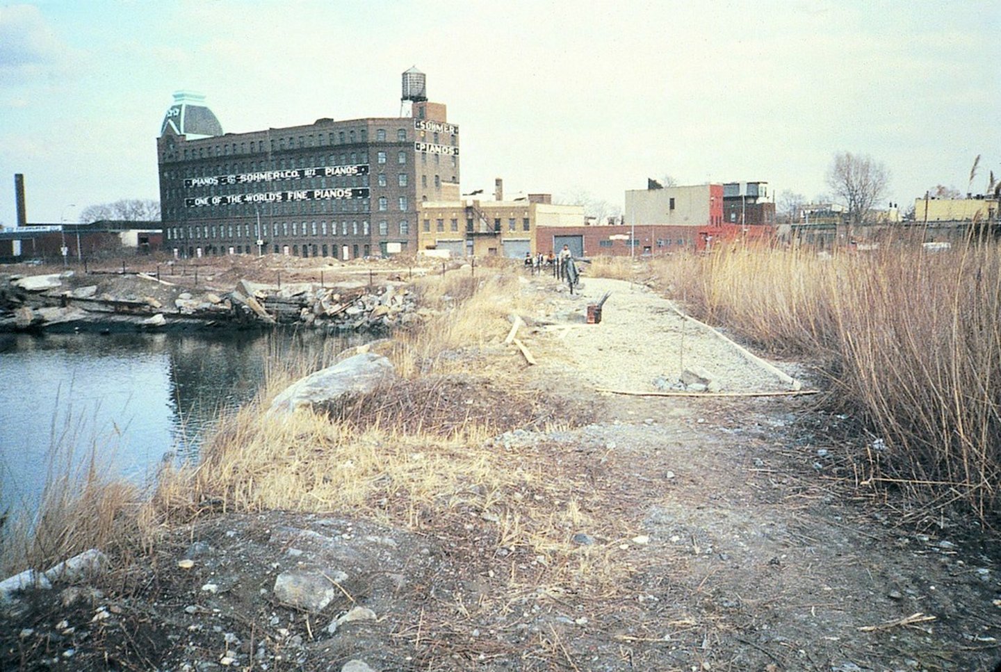 <p>a city area which is empty and in a bad condition</p>