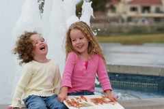 <p>pleasurably entertained, occupied, or diverted</p>