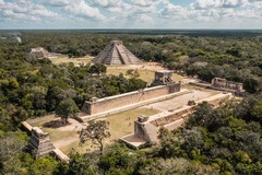 <p>A panoramic image of Chichen Itza shows pyramids, plazas, temples, and a ball court. Students should recognize that the site:</p>