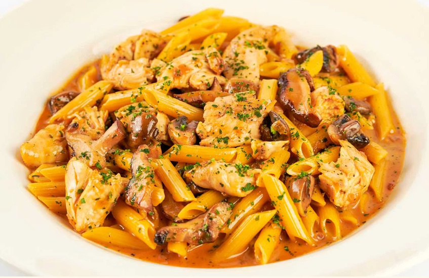 <p>Sauteed Chicken, Mushrooms and Onions in a Delicious Madeira Wine Sauce Tossed with Penne Pasta</p>