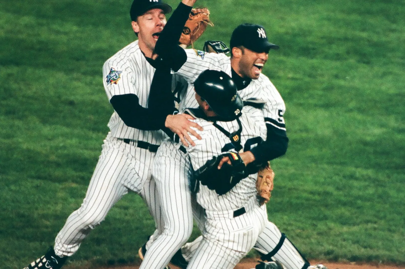 <p><strong>New York Yankees</strong> <strong>(x2)</strong> over ATL in 4 (SS Derek Jeter, CF Bernie Williams, SP David Cone) (25th franchise title, 3rd of decade)</p>
