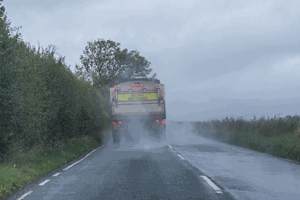 <p>You're following a lorry on a wet road. What should you do when spray makes it difficult to see the road ahead?</p>