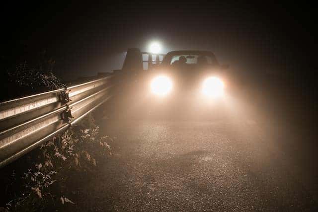 <p>You should use your headlights when it’s too dark to see from up to how many feet away?</p>