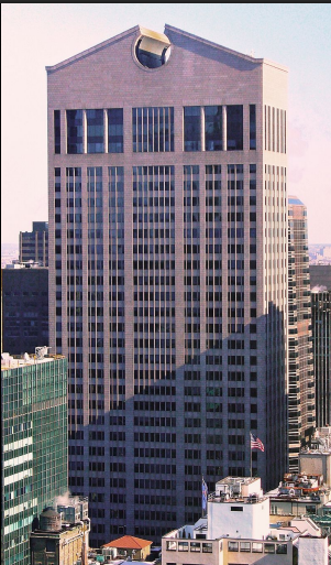 <p>Has a massive broken pediment atop the building and a massive arch entrance, and allowed for the building to be individual and have its own personality than being a massive glass box going against Mies Van Der Rohe</p>