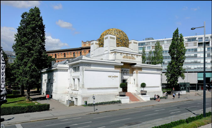 <p>This building was built in retaliation against the government arts programs that dictated what was and was not art. The Jugenstil was a place where sesessionists could gather to show off art and sculpture. ontop there is a sphere instead of a dome, showing how they are straying from architectural norms</p>