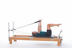<p><strong>Setup</strong></p><ul><li><p>Lying supine in neutral spine position, legs in tabletop position, arms straight and perpendicular to floor, hands in straps, palms facing forward</p></li><li><p>Resistance: light to medium | <strong>Springs: 1B or 1R</strong></p></li></ul><p><strong>Movement</strong></p><ul><li><p>Exhale: Lower arms to sides of body</p></li><li><p>Inhale: Lift arms, return to start position</p></li></ul><p><strong>Muscle Focus</strong></p><ul><li><p>Shoulder extensors</p></li><li><p>Elbow extensors</p></li><li><p>Scapular stabilizers</p></li><li><p>Spinal flexors</p></li><li><p>Hip flexors</p></li></ul><p><strong>Objectives</strong></p><ul><li><p>Shoulder extensor control</p></li><li><p>Scapular stabilization</p></li><li><p>Trunk stabilization</p></li></ul><p><strong>Cues</strong></p><ul><li><p>Maintain scapular stabilization</p></li><li><p>Keep trunk and legs stable</p></li><li><p>Keep arms straight</p></li><li><p>Maintain tension in straps</p></li></ul><p></p>