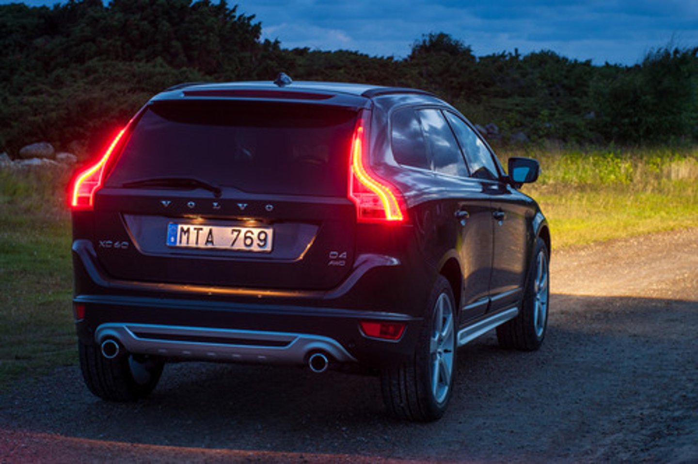 <p>Explain that you would operate the brake pedal and check that the brake light is on by either making use of reflections in windows or doors, or asking someone to help</p>