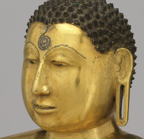 <p>a whorl of hair represented as a dot between the brows; one of the lakshanas of the Buddha</p>