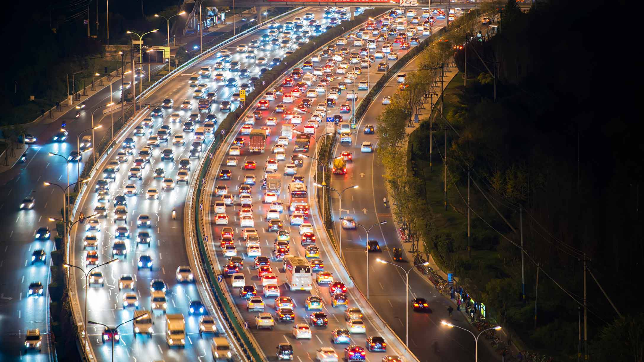 <p>is <mark>a condition on a road where a line of vehicles is unable to move or is moving very slowly due to excessive volume, a blockage, or spontaneous driver behavior</mark></p>