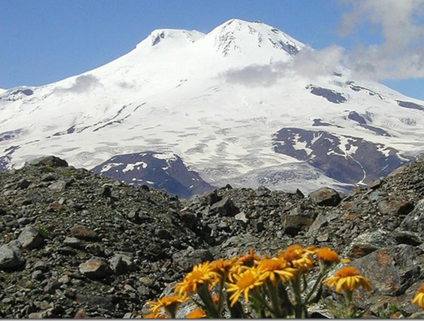<p>TRANSLATION: Кавказ</p><p>DEFINITION: A region at the border of Europe and Asia, situated between the Black and the Caspian Seas, home to the Caucasus Mountains.</p><p>EXAMPLE: Some of my classmates went hiking in .................. last year and said the mountains were incredible. Некоторые мои одноклассники ходили в поход на КАВКАЗ в прошлом году и говорили, что горы там невероятные.</p>