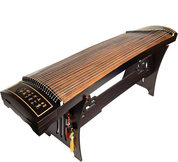 <ul><li><p><span style="color: rgb(206, 191, 94);"><strong>21-string</strong> </span>plucked zither; delicate, cascading tones. (Chordophone)</p></li></ul><p></p>