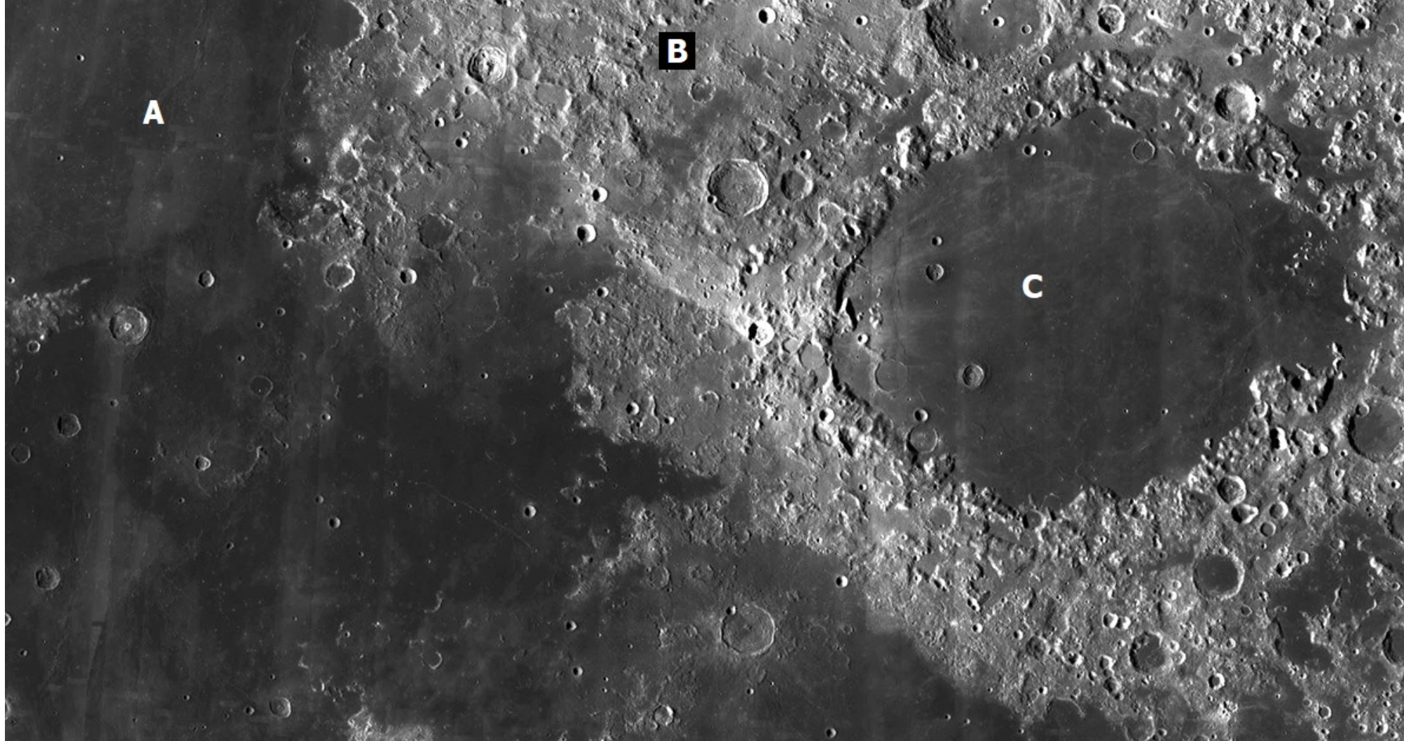 <p><span>On this photo of the Moon, click on a part of the highlands.</span></p>